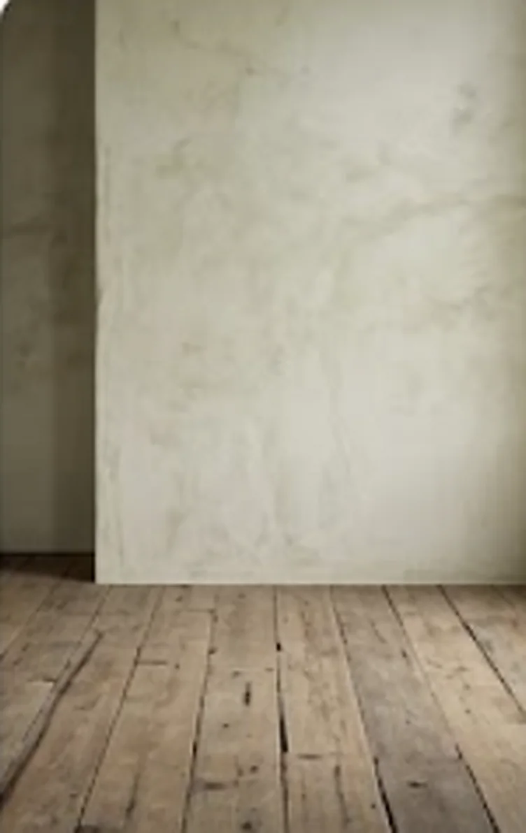 Gestucte wand met houten vloer